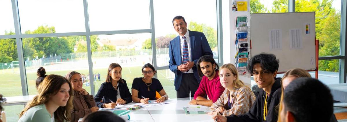 Nower Hill member of staff and students