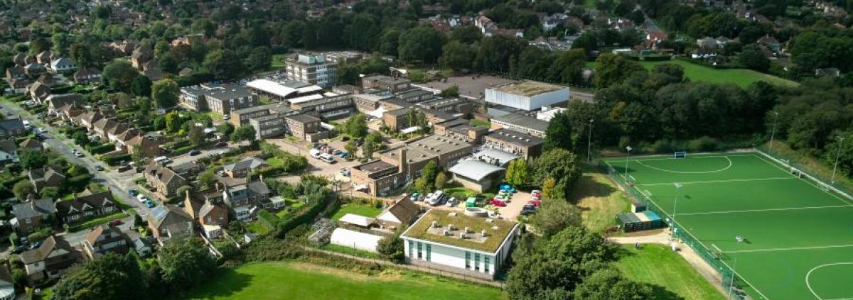 A drone shot of Beacon Academy Beeches site, showing the school buildings, grounds and sports facilities.