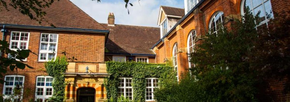The front of the Judd school, showing the schoolroom windows and main double door into the foyer.